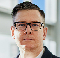 Alexander Hughes, izvršni direktor (CEO) tvrtke za trgovanje kriptovalutama, portret čelnika